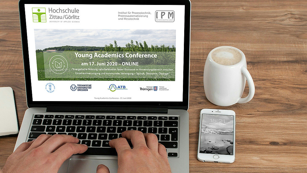 You can see a laptop with the title slide of the presentation
